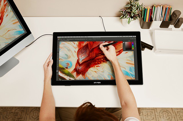 Tablet con arte digital para comercializar productos digitales tienda en línea Shopify